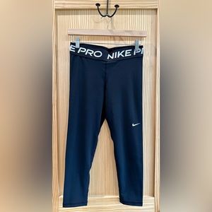 Nike Pro 7/8 high-waisted mesh panel leggings